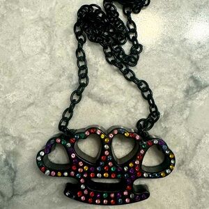 Rock rebel brass knuckle necklace